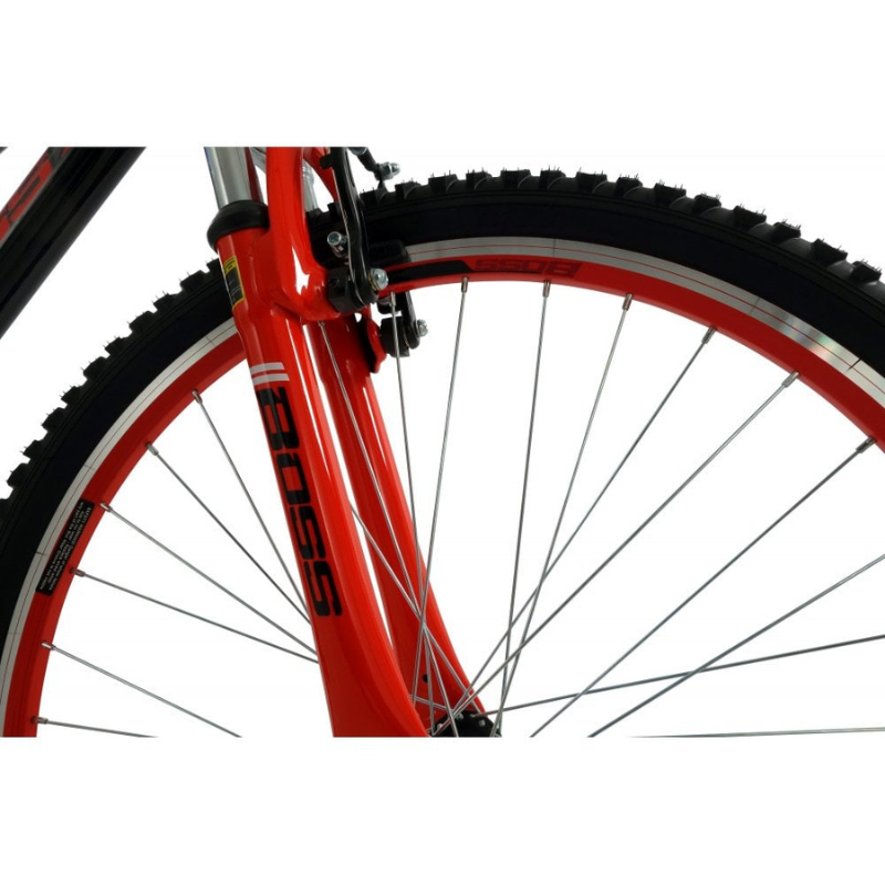 Close-up of a red bicycle wheel with a white background