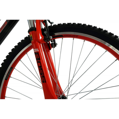 Close-up of a red bicycle wheel with a white background