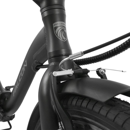 Close-up of a black bicycle with 'Falcon' branding on a white background