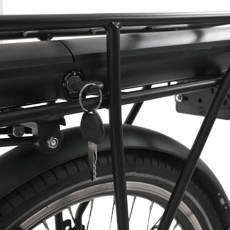 Falcon Breeze Close-up of a bicycle rack with a key attached to battery on a white background