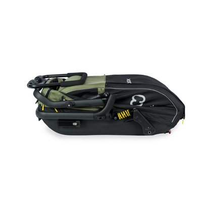 A folded stroller in a black and olive green, shown from a side profile on a white background. The brand name 'hamax' is visible in white on the side of the bag.